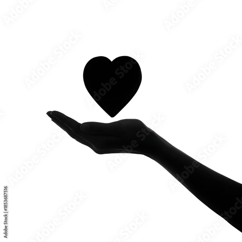 A silhouette of a hand offering a glowing heart against a black background