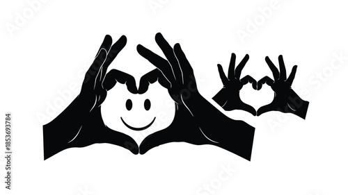 Hands creating heart shapes and a smiling face with shadow puppets