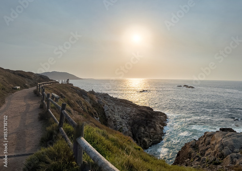 Coastal Pathway Overlooking Ocean at Sunset