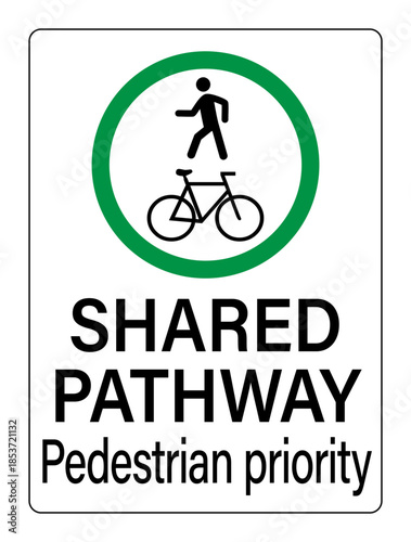 Shared pathway, pedestrian priority. Road sign with walking person symbol and bicycle symbol inside a green circle icon