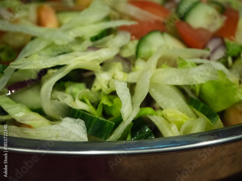 Bowl of salad with lettuce and vegetables
