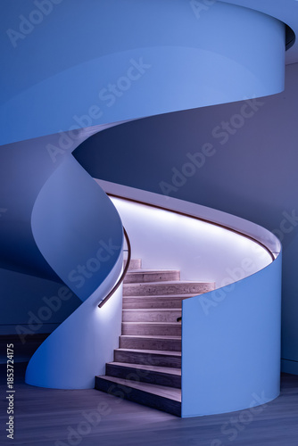 Blue Minimalist Spiral Staircase with LED Handrail Lighting