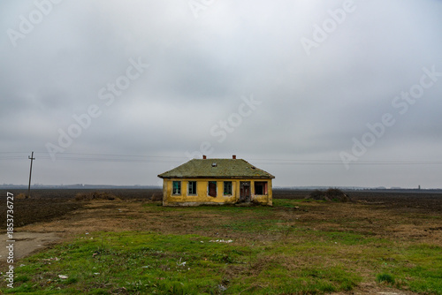 Old abandoned house in a field