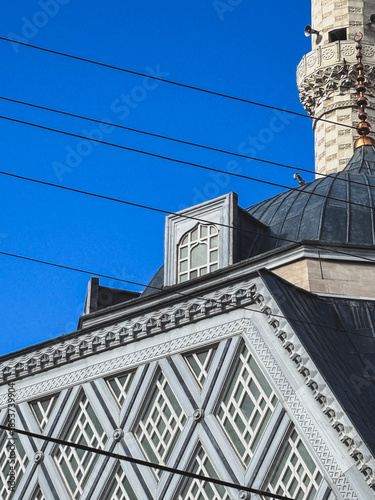 Historic Mosque Architecture with Patterned Facade and Dome