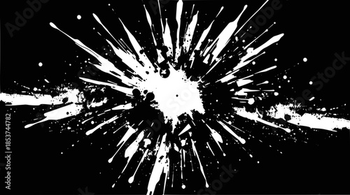 Dynamic white paint splatter explosion on a stark black background, creating an abstract and energetic visual effect.