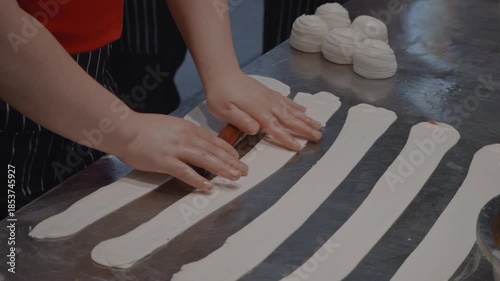 Experienced Dough Artisan Methodically Creates Evenly Stretched Ribbon Pieces For Street Food Pies