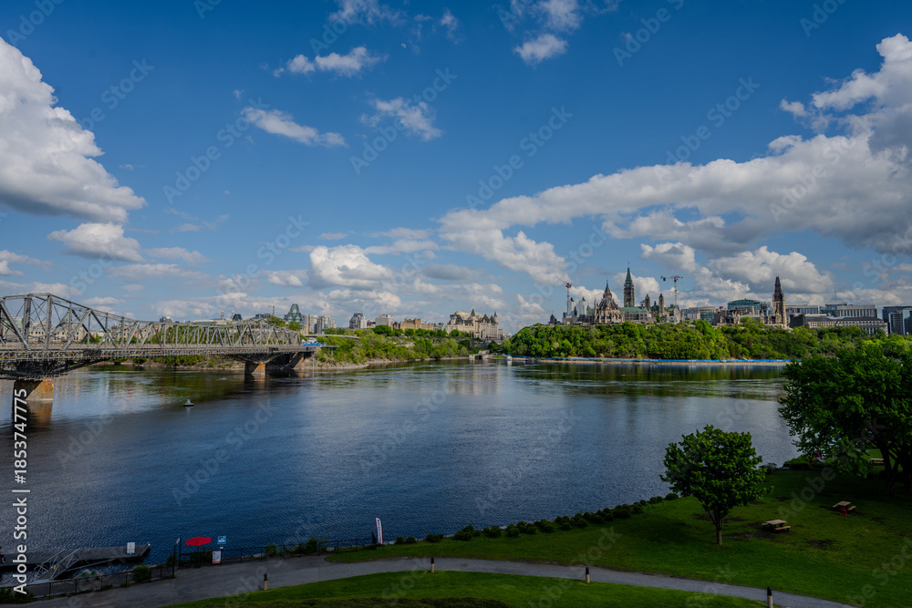 Fototapeta premium Alexandra Bridge over Ottawa River with Parliament Hill in the distance