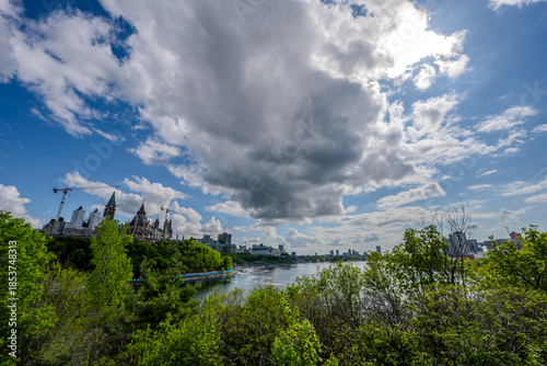 Dramatic clouds over the Parliament of Canada and Ottawa River