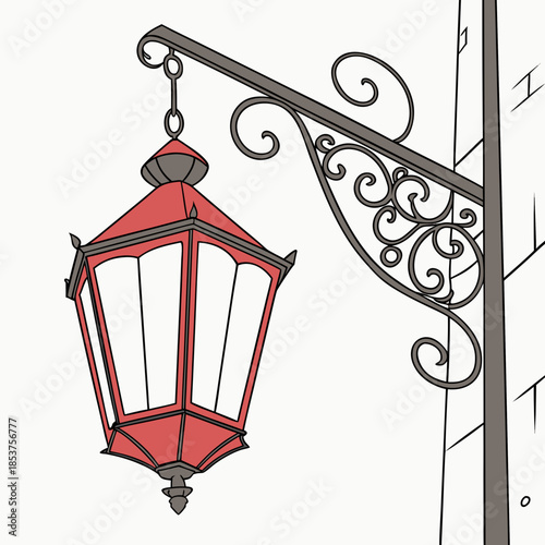Classic street lamp hanging from ornate bracket