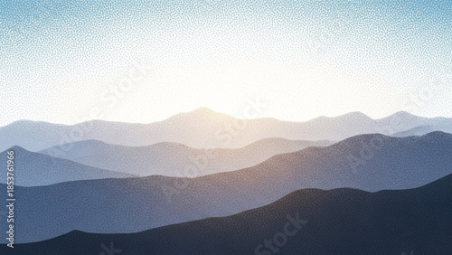 Layered blue mountain range at sunrise serene landscape with soft light and atmospheric haze perfect for travel and nature backgrounds