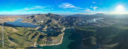 Cinematic Aerial 4K: Sweeping Wide-Angle Sunset Over Guadalhorce Lake, Pine Forests, and the Dramatic Caminito del Rey Gorge in Andalusia