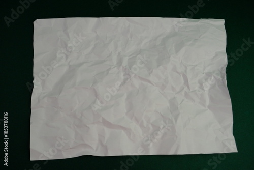 Crumpled piece of white paper grunge background. Recycled craft paper texture background.