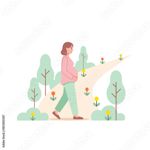 Pregnant woman walking on nature trail surrounded by flowers  