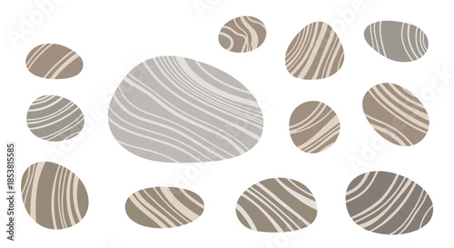 A collection of smooth organically shaped stones and pebbles in neutral earth tones with abstract wavy line patterns on them.