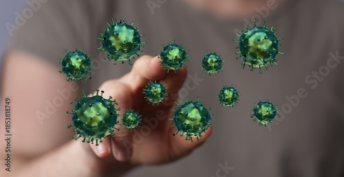 Photography Illustration of a hand interacting with virus particles