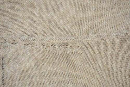Textura o fondo de tejido de lana de jersey blanco o beige. 