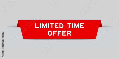 Red color inserted label with word limited time offer on gray background