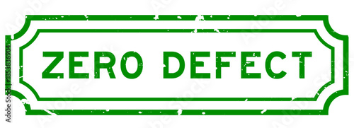 Grunge green zero defect word rubber seal stamp on white background