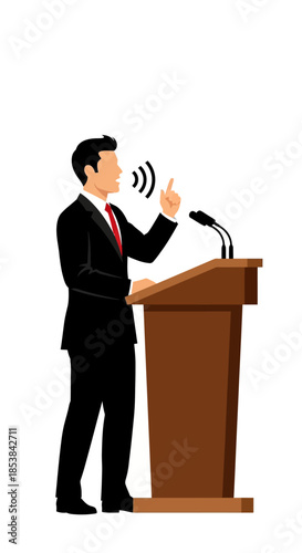 Man in Suit Speaking at Podium with Microphones.