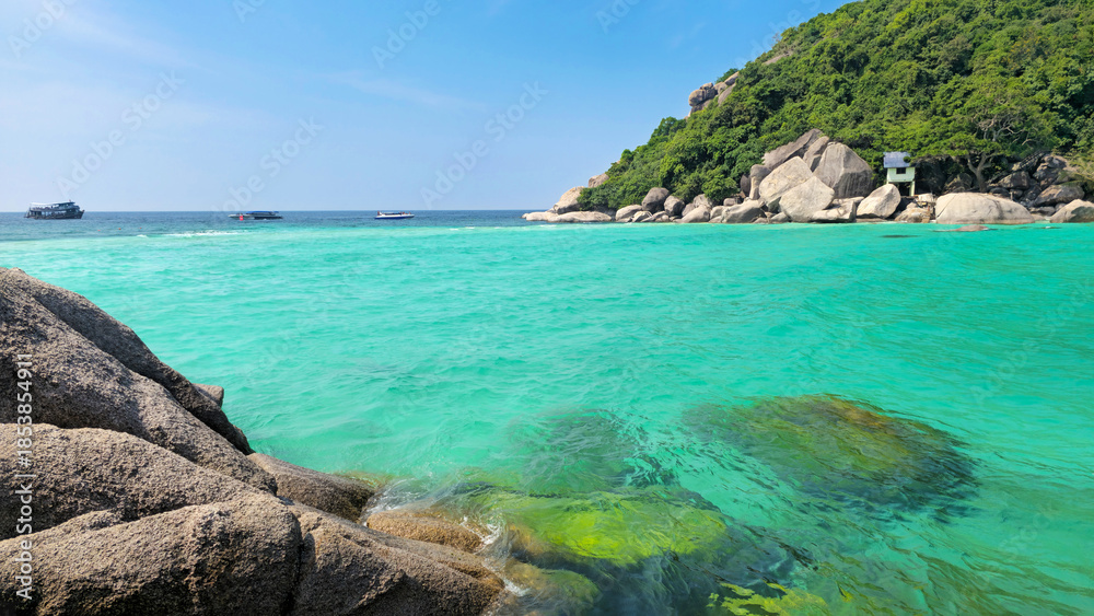 Fototapeta premium Koh Nang Yuan Island with clear turquoise water and excursion boats, Surat Thani, Thailand, Southeast Asia.