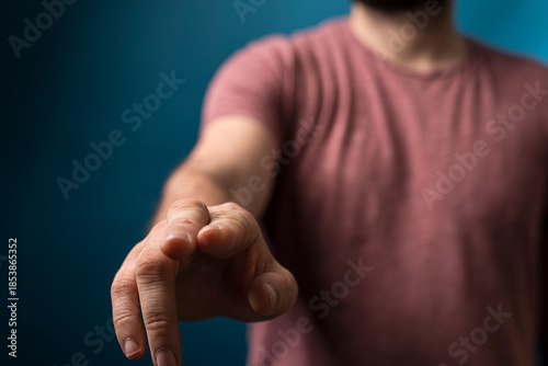 Close up of a man's hand po...