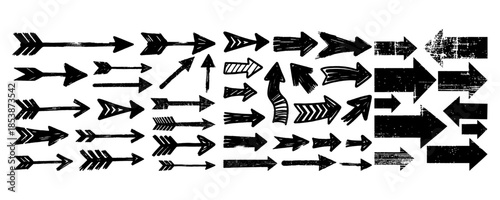 A diverse set of black grunge-style hand-drawn arrows in various shapes and orientations on a white background, symbolizing direction or motion