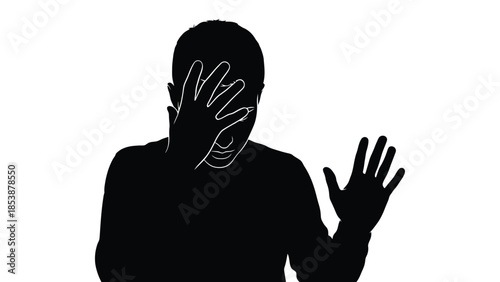 Silhouette of a man displaying an unmistakable facepalm gesture expressing deep regret or shame