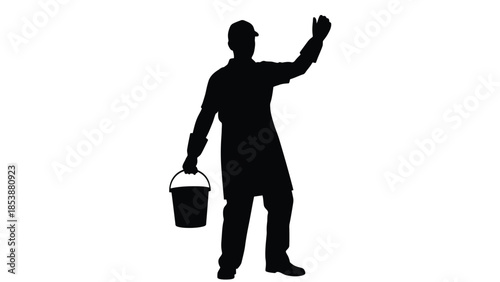 Silhouette of a construction worker or painter holding a bucket and raising one hand