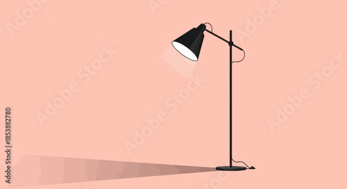 A modern black floor lamp casting a shadow on a pink background.