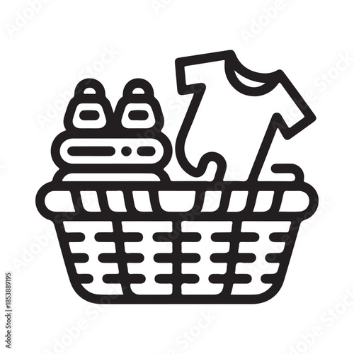 A laundry basket filled with folded clothes and additional garments