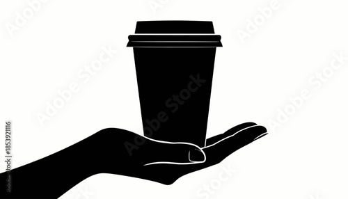 Silhouette of a hand holding a disposable coffee cup with a lid