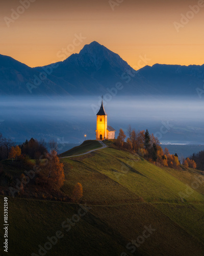 Misty Slovenian Landscape in over Jamnik Church