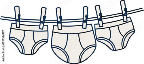 Three Pairs Of Underwear Hanging On A Clothesline With Clothespins briefs pants