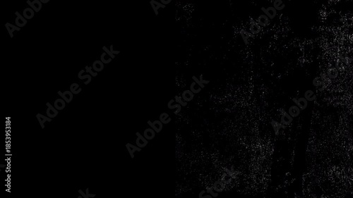 Old Vintage Dark noisy 4K background featuring vintage film grain and scratches.