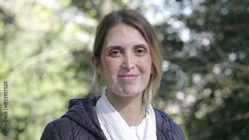 A blonde woman with vitiligo smiles happily, expressing confidence, self-acceptance, and positivity. Bright and empowering portrait celebrating diversity, beauty, and authenticity.