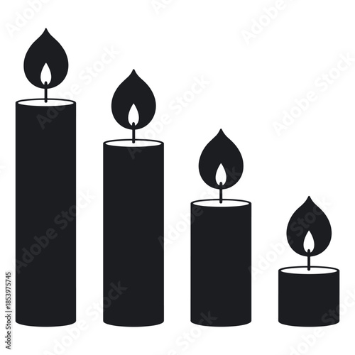 Four black candles with flames in a row