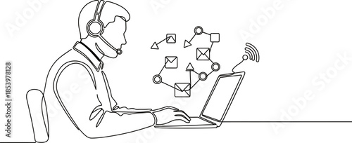 A man wearing a headset sitting at a desk working on a laptop with email and network icons around him