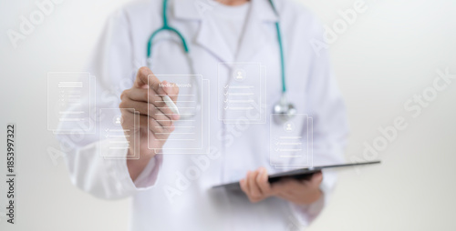 Doctor manages digital medical records on virtual interface while holding tablet showing healthcare documentation patient data security and modern hospital information system concept