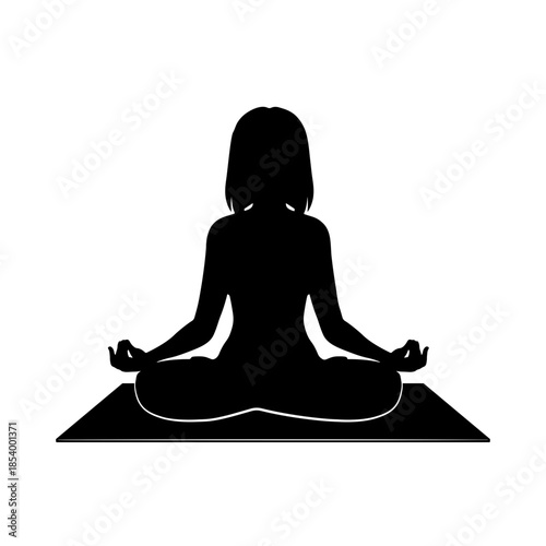 Black silhouette of a woman practicing yoga in lotus pose on a mat without background.