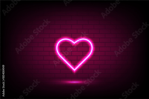 Bright neon pink heart shape glowing on a dark brick wall with soft light reflection, romantic and modern style