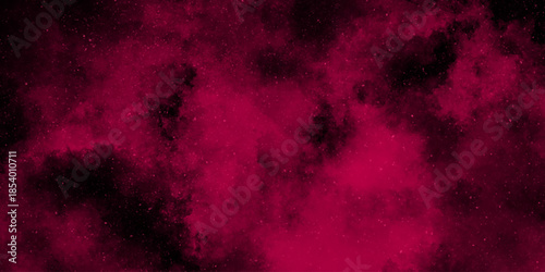 Black background with dark pink ink. Abstract background with smoke. color splashes isolated on black background. 