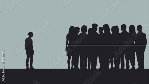 Silhouette of isolated individual facing group in contrasting light