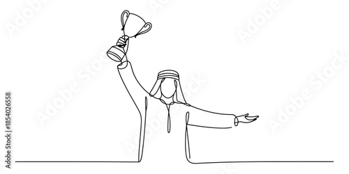Happy arab man wearing ghutra celebrating victory while holding a golden trophy