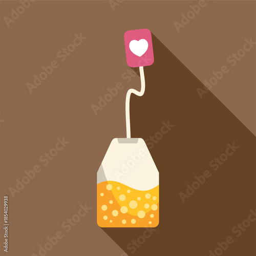 Tea bag steeping hot herbal beverage with heart shaped tag