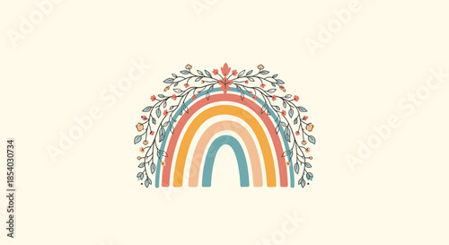 Boho style rainbow in soft pastel colors topped with a symmetrical arrangement of delicate flowers and leafy branches.