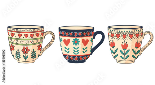 Set of three decorative ceramic mugs with intricate floral and heart patterns in blue red and cream colors on white background.