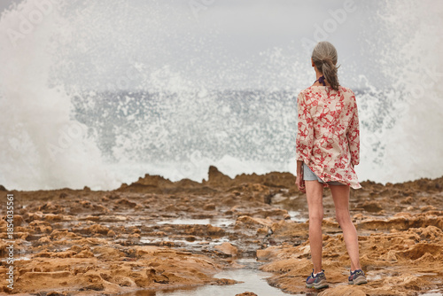 Mature woman looking the sea. Retiremet pensioner elderly. Relaxing lifestyle