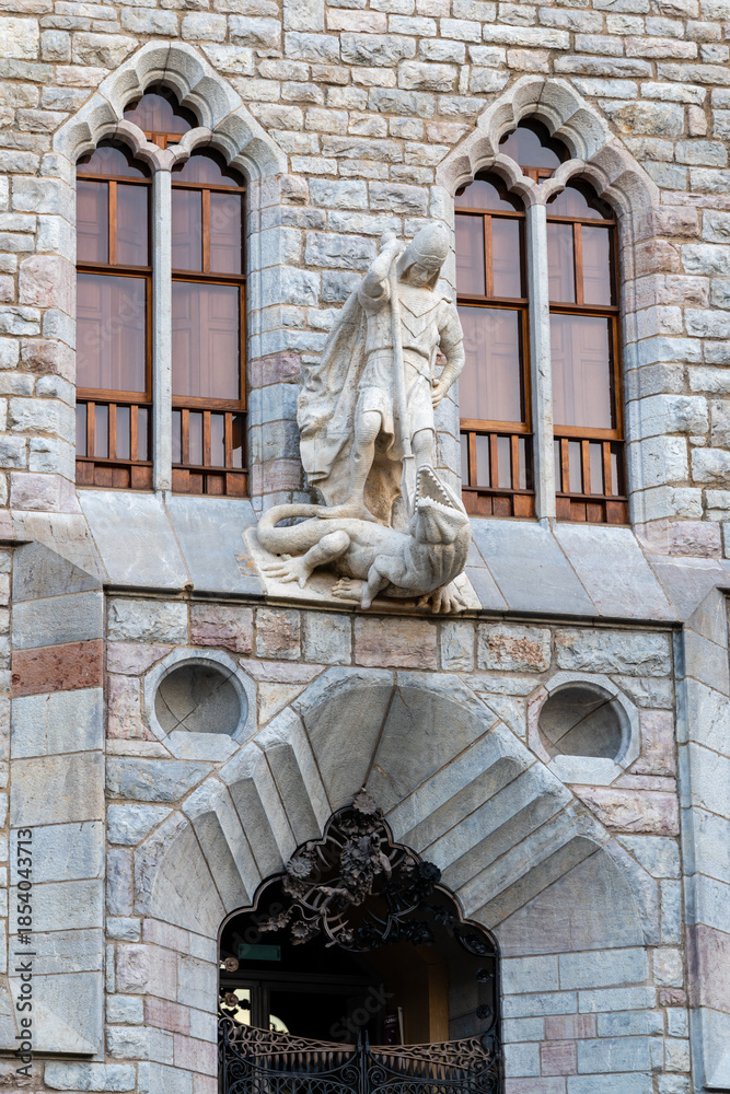 Obraz premium Leon, Spain - November 02, 2024: Exterior facade of Casa de Botines by architect Gaudi in the city of Leon, Spain