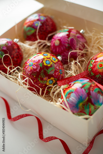 Christmas tree decorations with Petrikov painting in a box