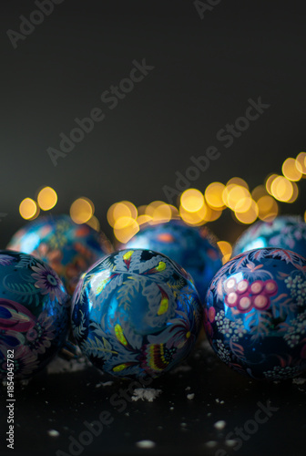 Composition of New Year's balls painted with Petrykivka painting